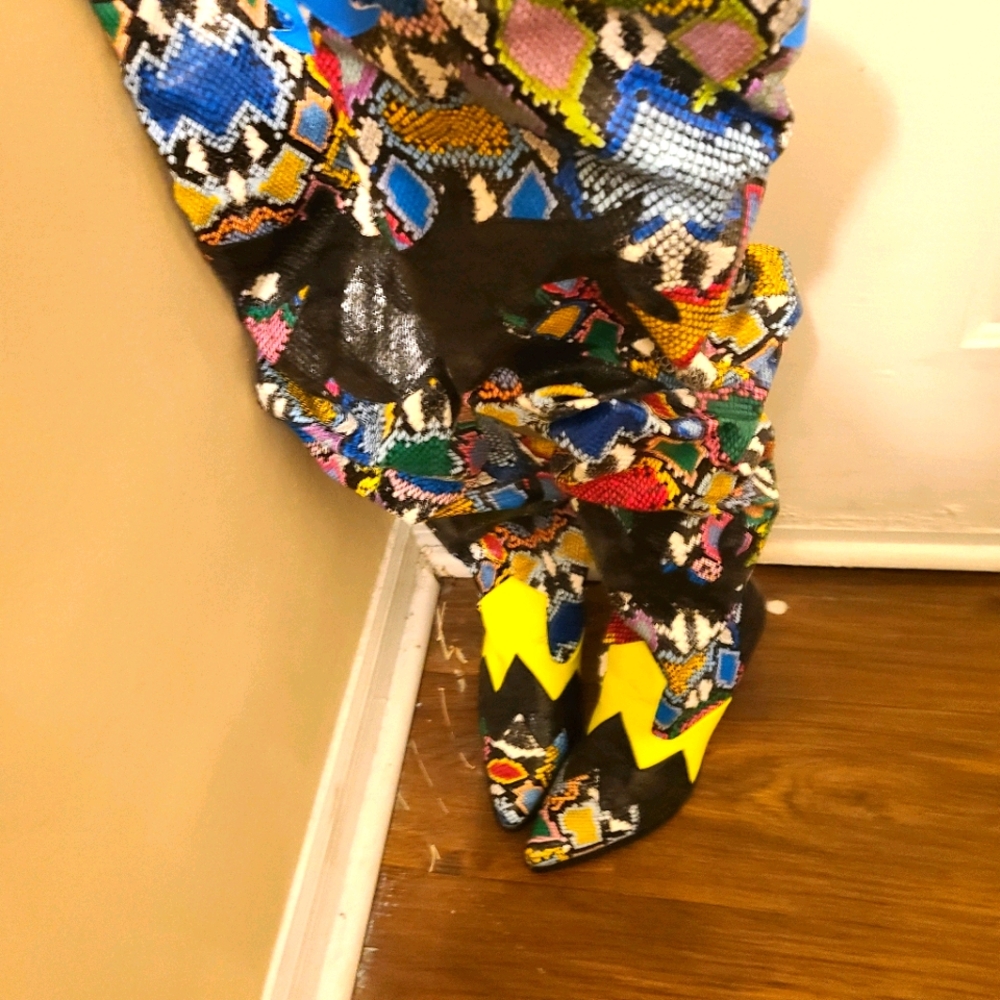 One time use lightly worn thigh high boots. Pictur